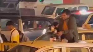 Gurugram man seen drinking, doing push-ups on top of moving car in video, police lodge FIR