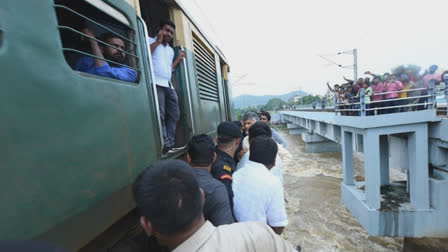  Unperturbed over speeding train, Andhra CM Naidu inspects flood relief work